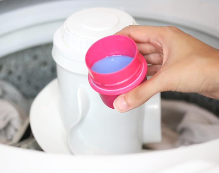 putting fabric softener in washing machine
