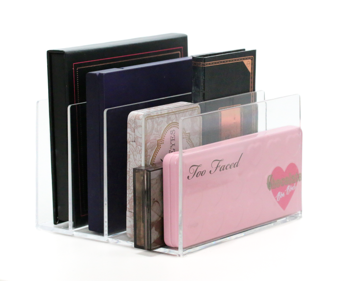 plastic letter holder holding eye shadow palettes