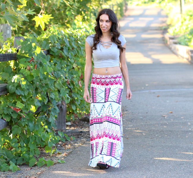 Girl wearing printed maxi skirt and crop top