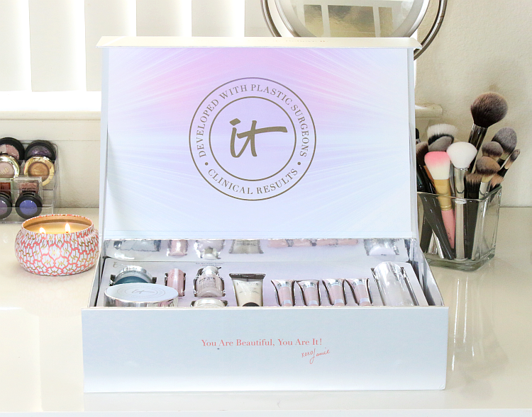 Box of IT Cosmetics products on a vanity