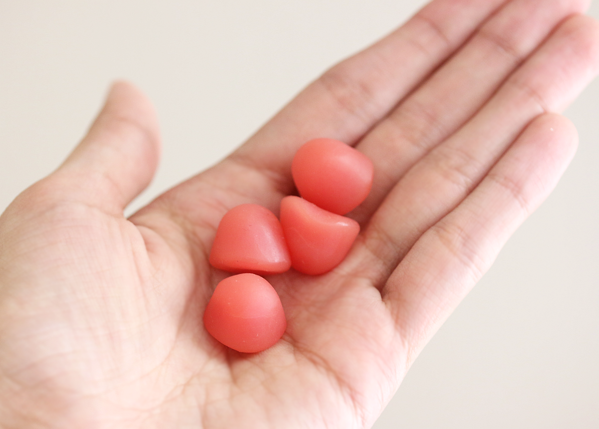 vitamin gummies on palm