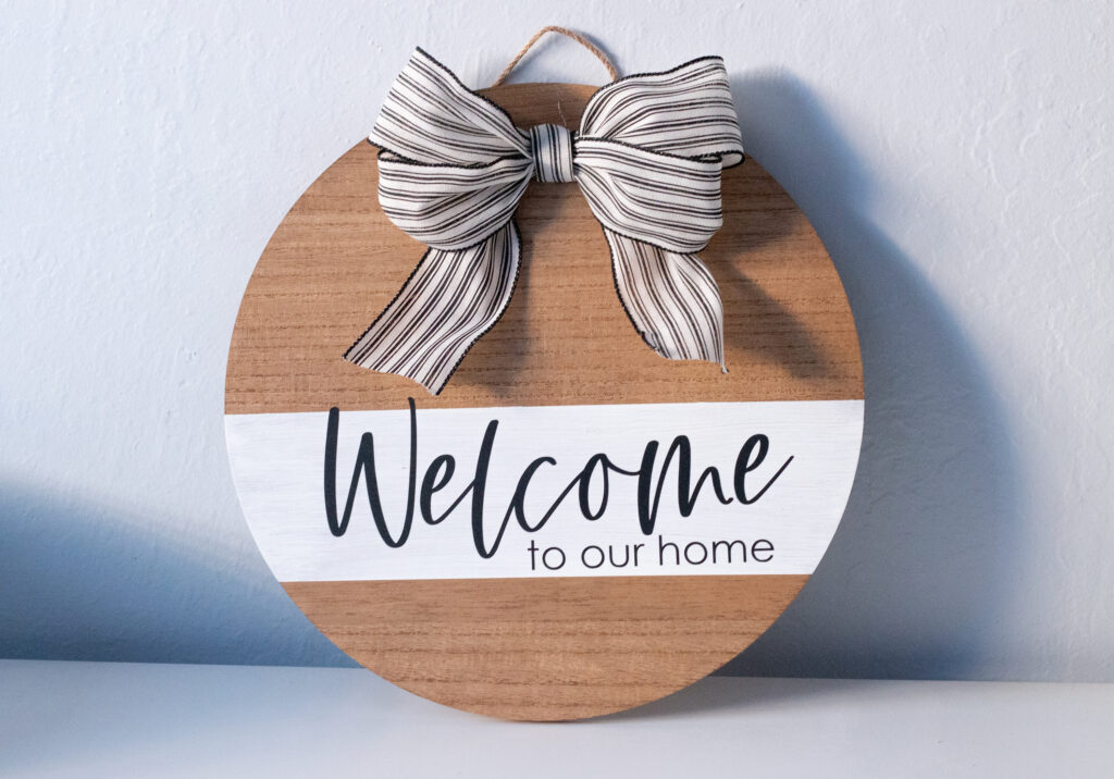 Welcome to our home wooden sign