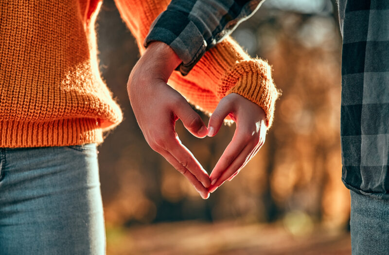 two hands forming a heart together