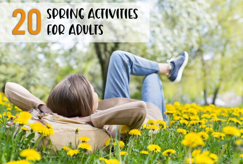 girl laying in the grass with yellow flowers